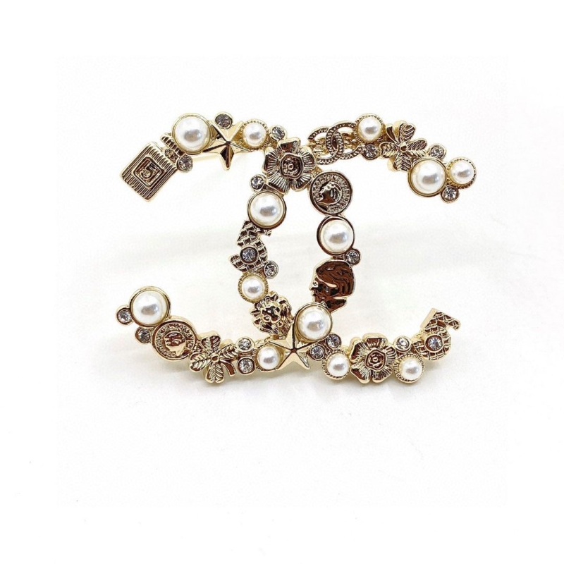 Ch*el brooches